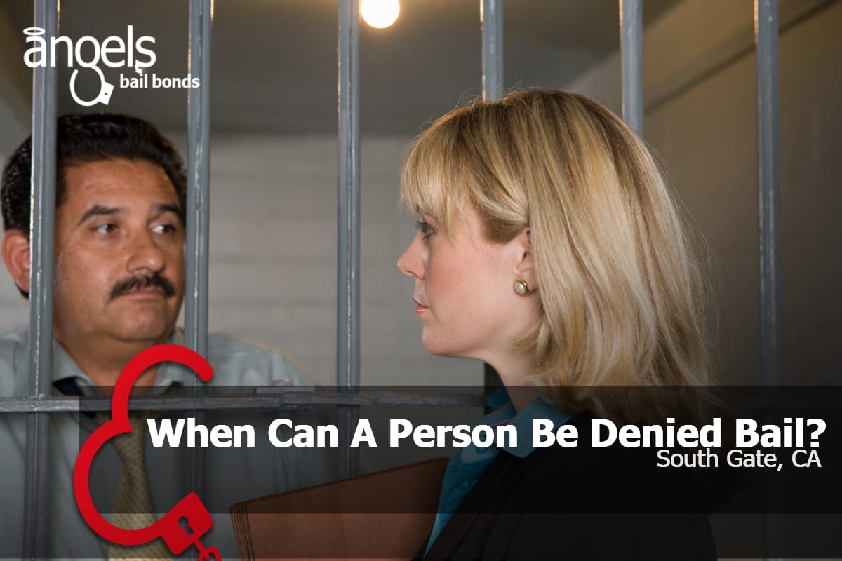 Lawyer with person behind bars in jail