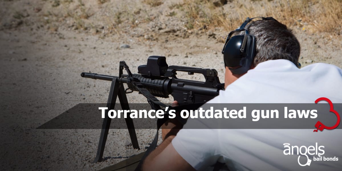 Man aiming machine gun at firing range Torrance